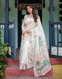 Ivory Pure Cotton Linen Saree with Pastel Floral Design, Blouse, and Tassel Detailing