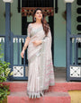 Soft Grey Pure Cotton Linen Saree with Pink and White Ikat Design, Blouse, and Tassel Detailing