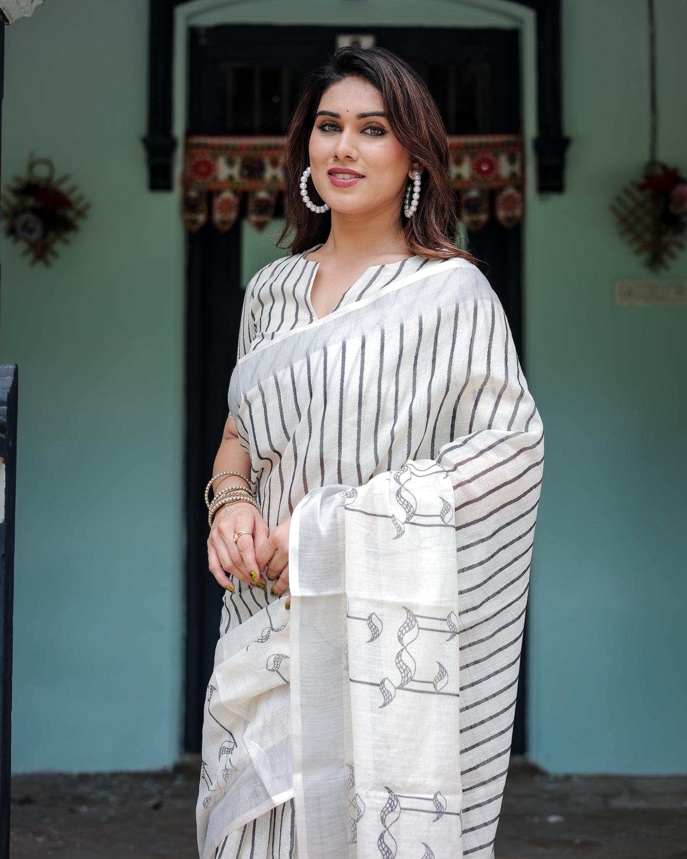 White and Black Pure Cotton Linen Saree with Striped Pattern, Blouse, and Tassel Detailing