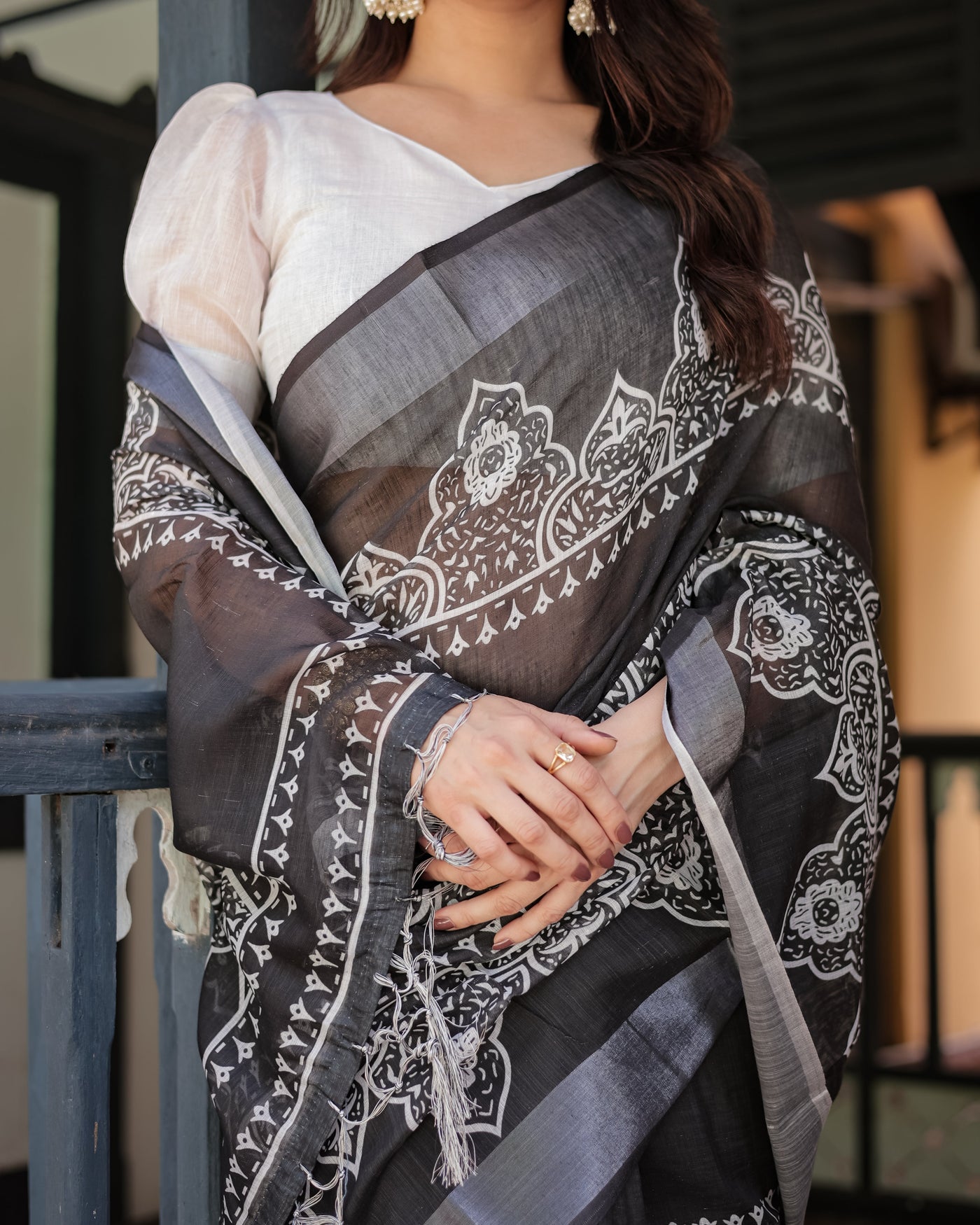 Black and White Pure Cotton Linen Saree with Intricate Floral Design and Tassels on Edges