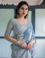 Pastel Blue Floral and Geometric Printed Cotton Linen Saree with Blouse and Tassel Edges