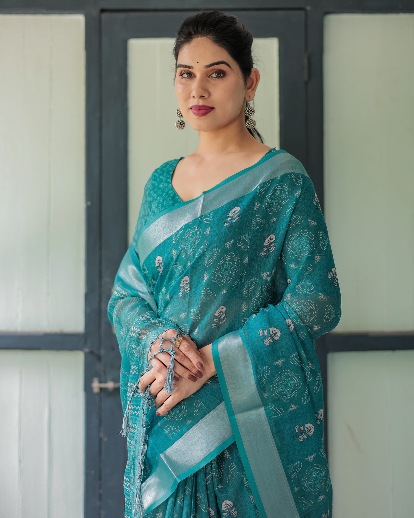 Teal Green Pure Cotton Linen Saree with Silver Floral Motifs and Tassels