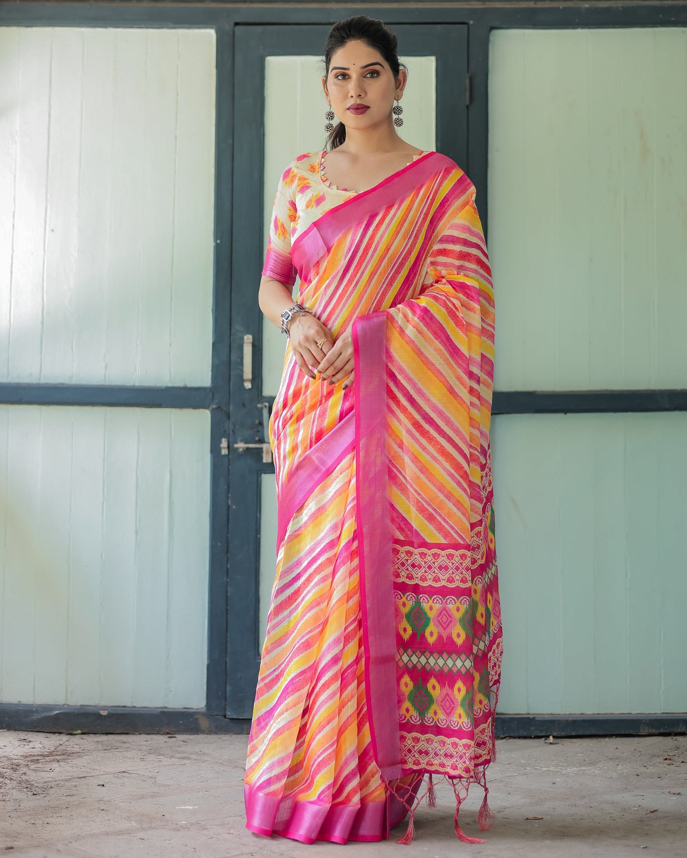 Vibrant Yellow and Pink Ikat Printed Cotton Linen Saree with Blouse and Tassels