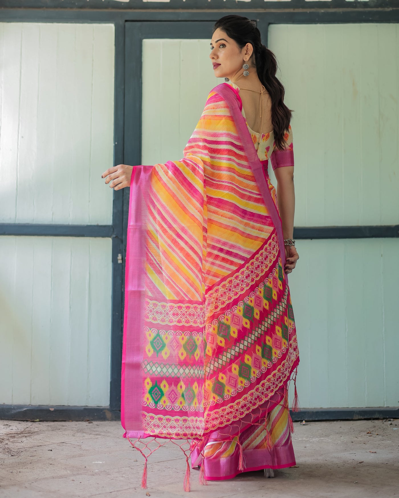 Vibrant Yellow and Pink Ikat Printed Cotton Linen Saree with Blouse and Tassels