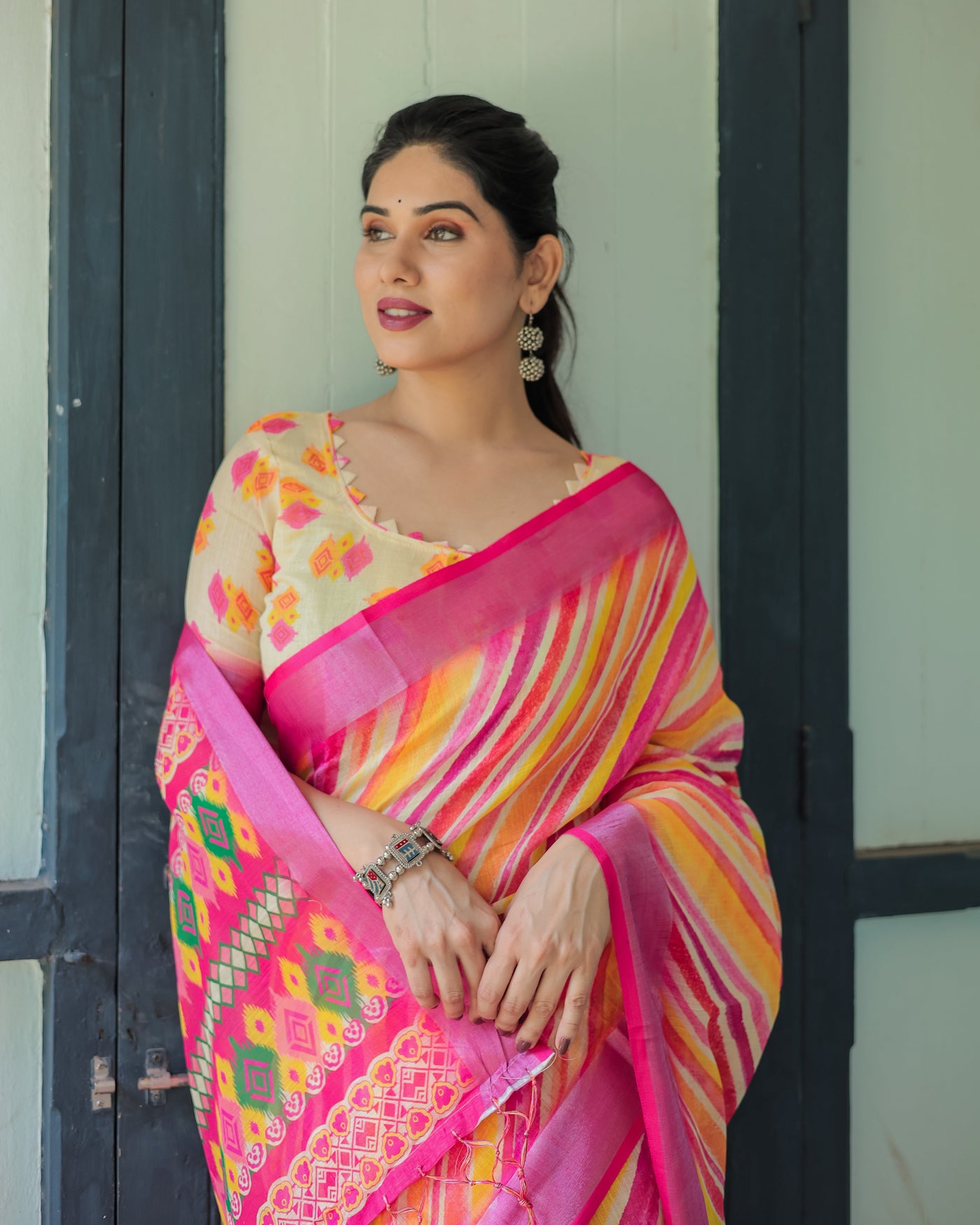 Vibrant Yellow and Pink Ikat Printed Cotton Linen Saree with Blouse and Tassels