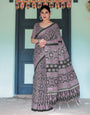 Black Pure Cotton Linen Saree with Pink Striped Pallu and Tassel Accents