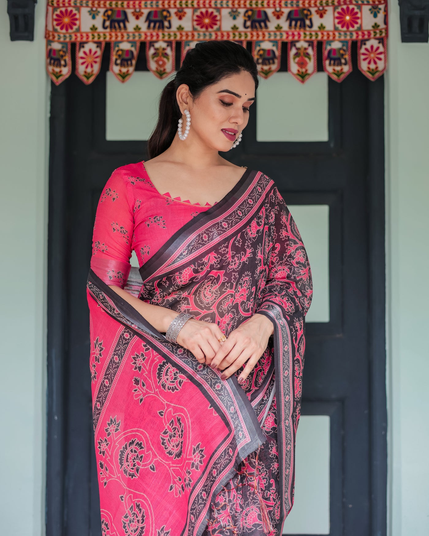 Pure Cotton Linen Saree in Black and Pink with Floral Print and Tassels