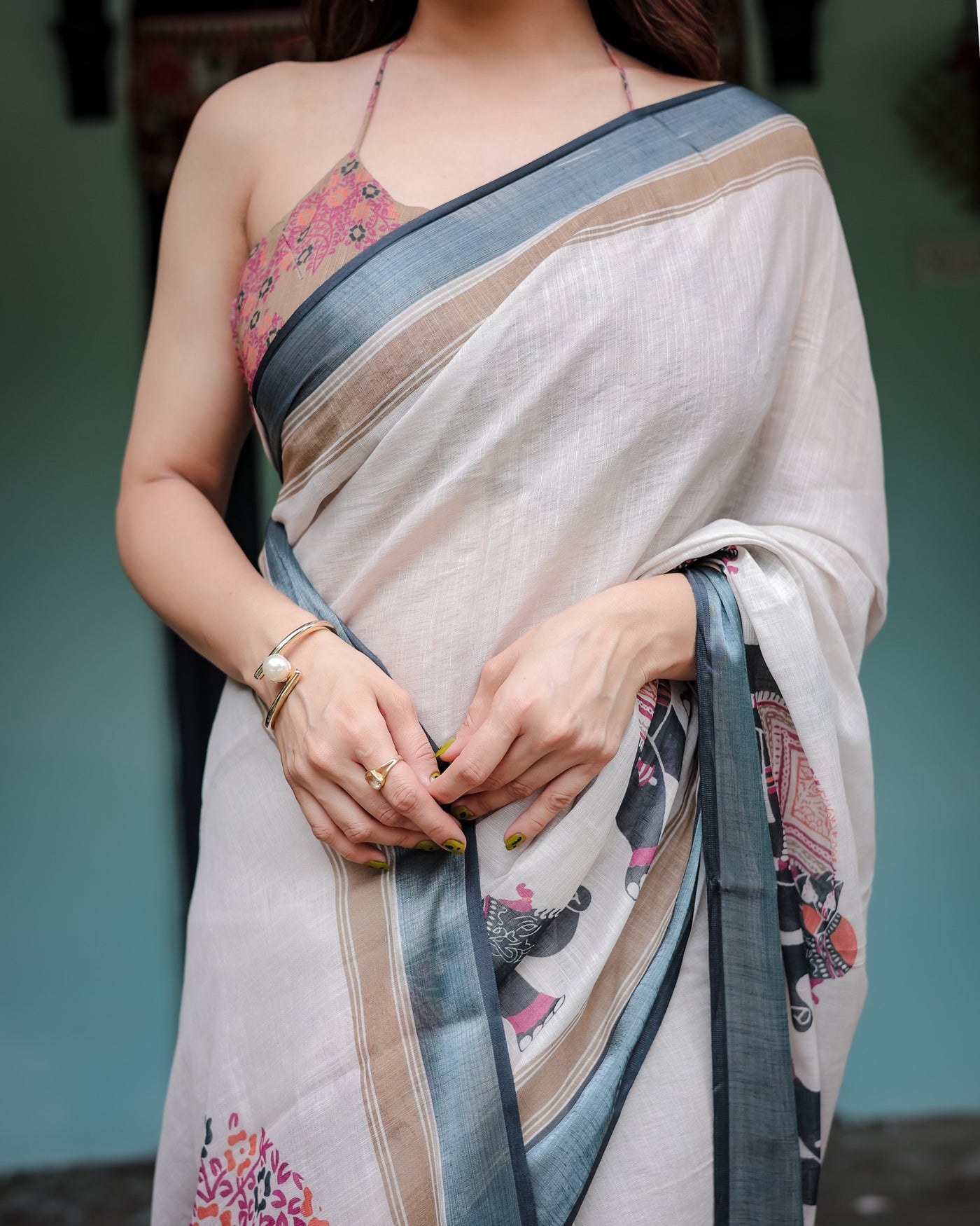 Ivory Pure Cotton Linen Saree with Elephant Motif and Tassel Detailing