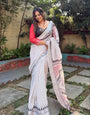 Elegant White Pure Linen Digital Printed Saree with Chevron Design and Intricate Red-Black Geometric Pallu – Tassel Details and Matching Blouse Piece