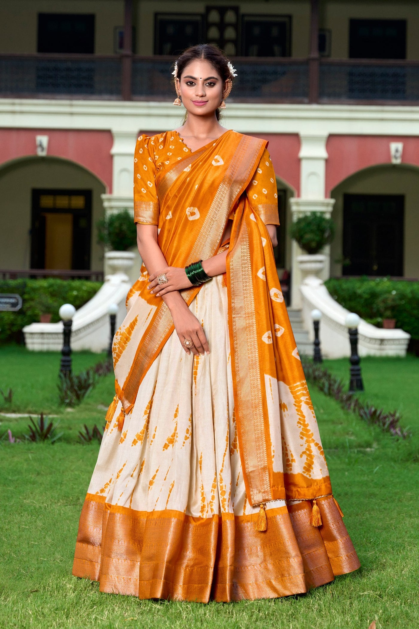 Orange & Ivory Shibori Print Dola Silk Lehenga Choli with Zari Weaving Border & Tassel Dupatta