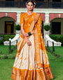 Orange & Ivory Shibori Print Dola Silk Lehenga Choli with Zari Weaving Border & Tassel Dupatta