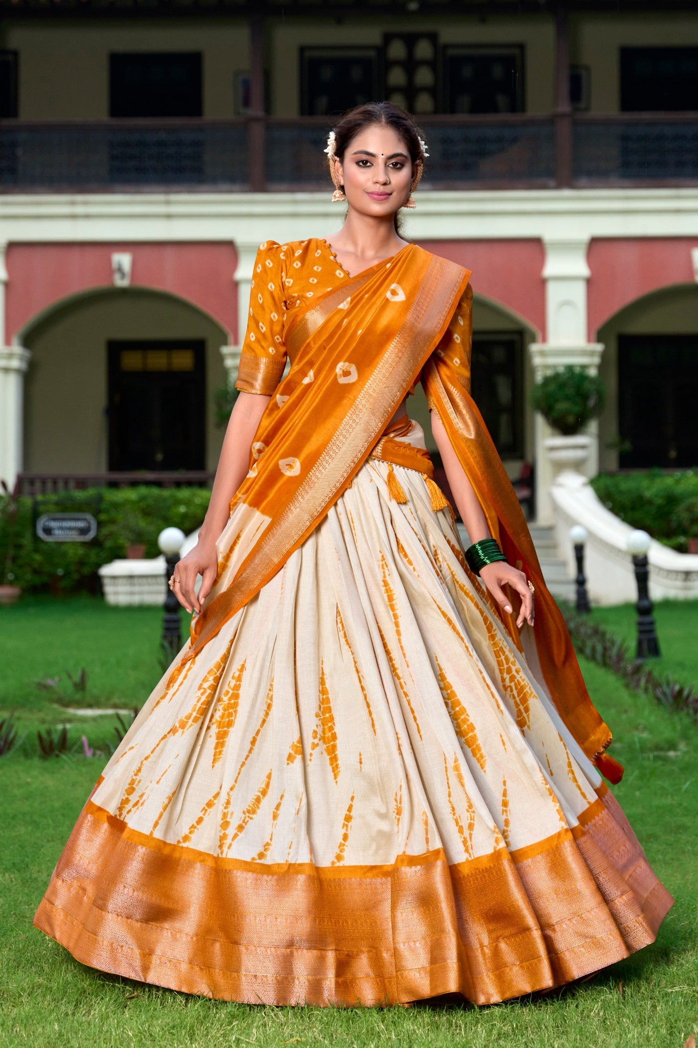 Orange & Ivory Shibori Print Dola Silk Lehenga Choli with Zari Weaving Border & Tassel Dupatta