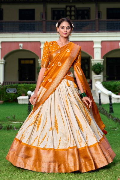 Orange & Ivory Shibori Print Dola Silk Lehenga Choli with Zari Weaving Border & Tassel Dupatta