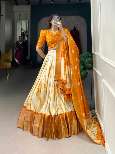 Orange & Ivory Shibori Print Dola Silk Lehenga Choli with Zari Weaving Border & Tassel Dupatta