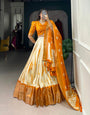 Orange & Ivory Shibori Print Dola Silk Lehenga Choli with Zari Weaving Border & Tassel Dupatta