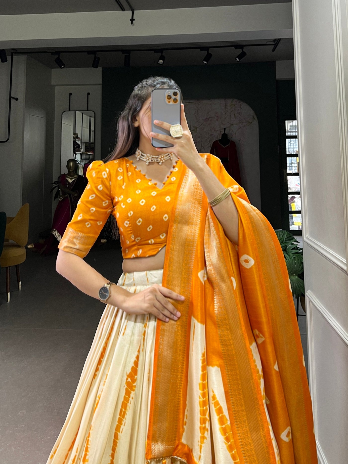 Orange & Ivory Shibori Print Dola Silk Lehenga Choli with Zari Weaving Border & Tassel Dupatta