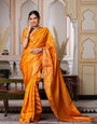 Yellow Color Pure Organza Saree Adorned with Zari Weaving, Complete with Matching Blouse Piece