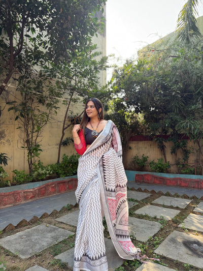 Elegant White Pure Linen Digital Printed Saree with Chevron Design and Intricate Red-Black Geometric Pallu – Tassel Details and Matching Blouse Piece