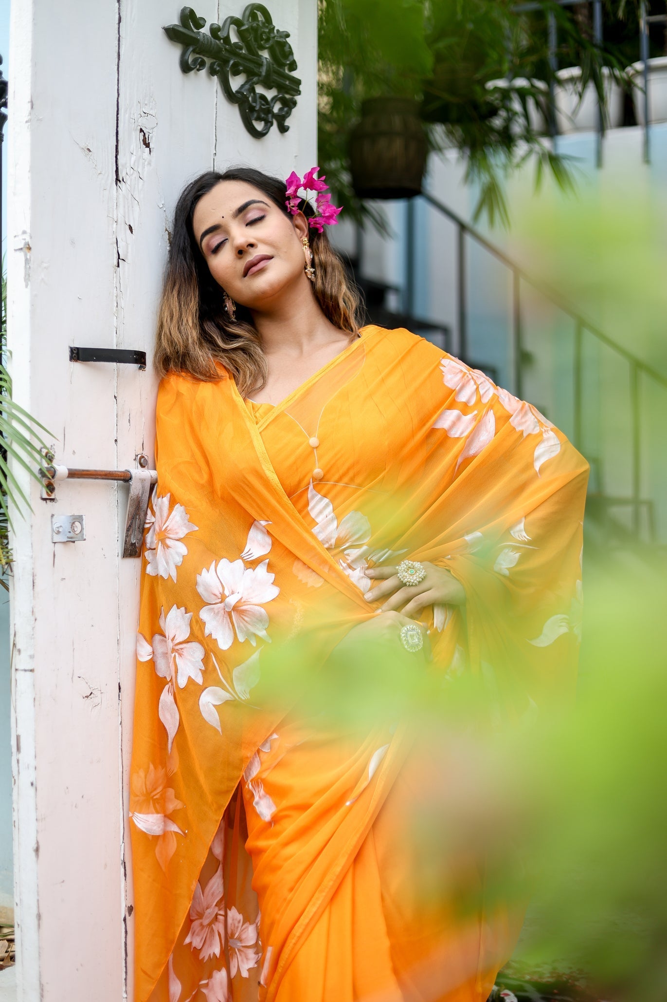 Sunset Orange Georgette Saree with Hand-Painted White Floral Motifs – Attached Blouse – 5.5 Meters
