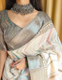 Elegant Beige Pure Linen Saree with Multicolor Zigzag Design and Tassel Finish