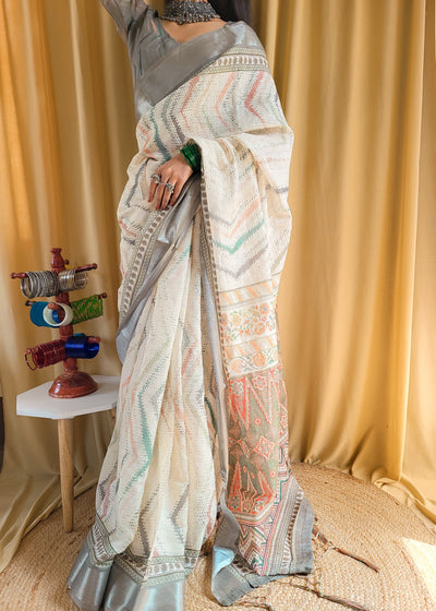 Elegant Beige Pure Linen Saree with Multicolor Zigzag Design and Tassel Finish