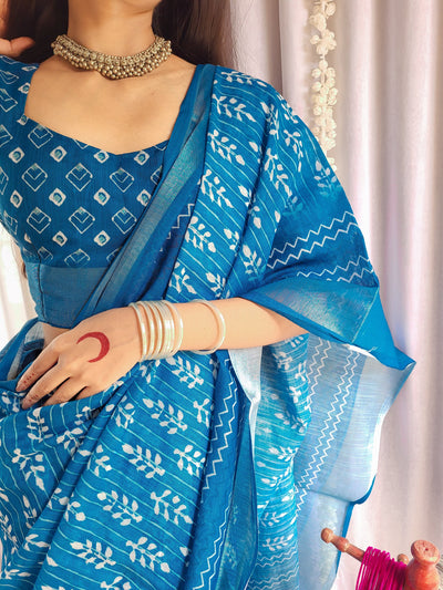 Elegant Blue Pure Linen Saree with Tassels and White Floral Patterns