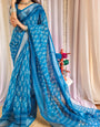 Elegant Blue Pure Linen Saree with Tassels and White Floral Patterns