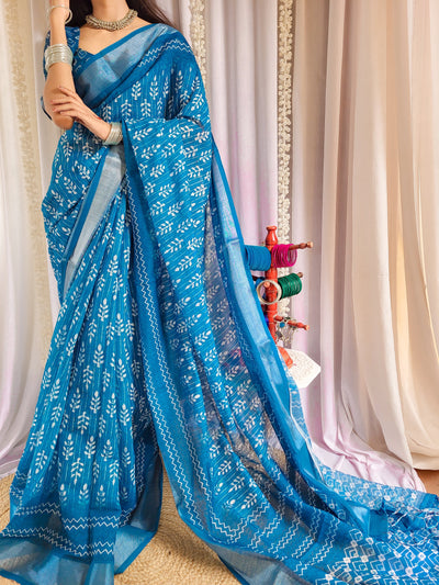 Elegant Blue Pure Linen Saree with Tassels and White Floral Patterns