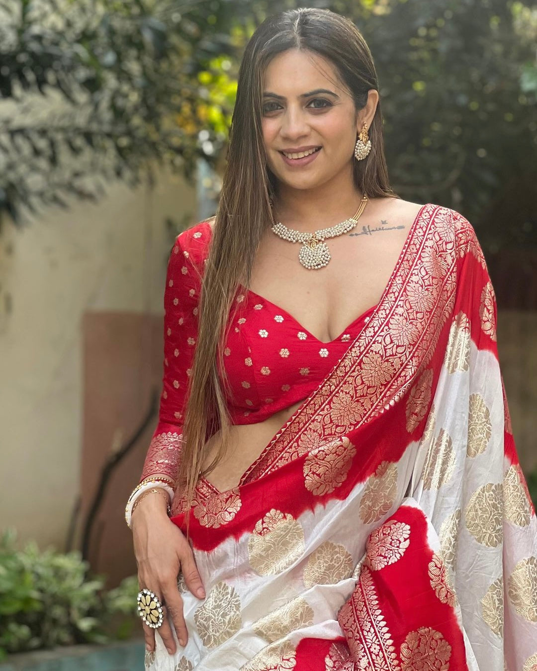 White & Red Viscose Saree Weaved With Golden Zari