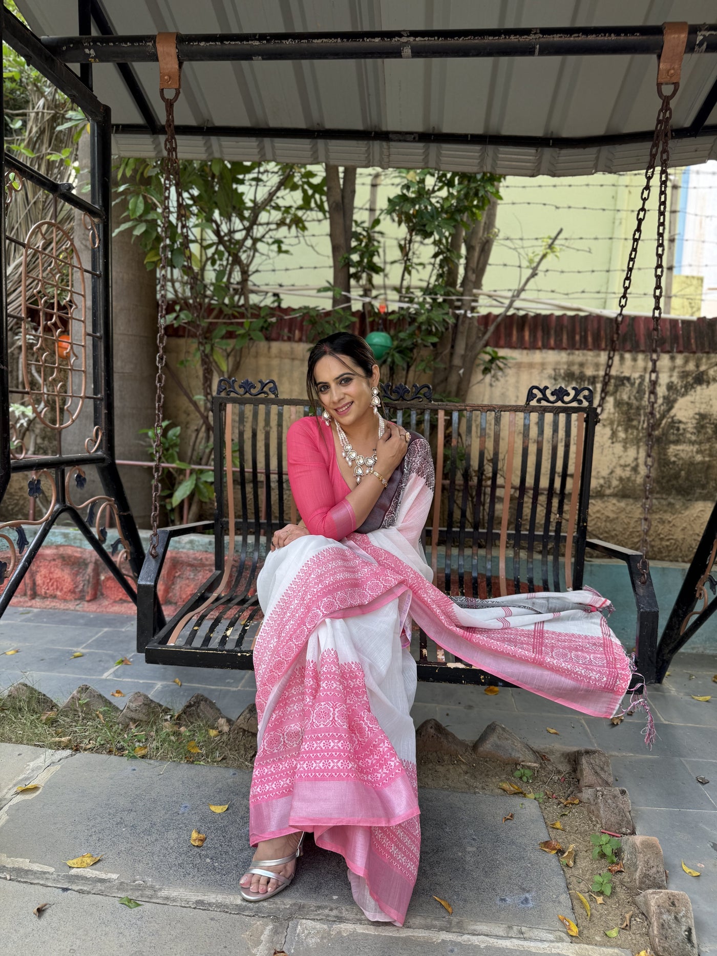 Elegant White and Pink Pure Linen Digital Printed Saree with Black Border, Tassels, and Blouse Piece – Intricate Floral and Geometric Design