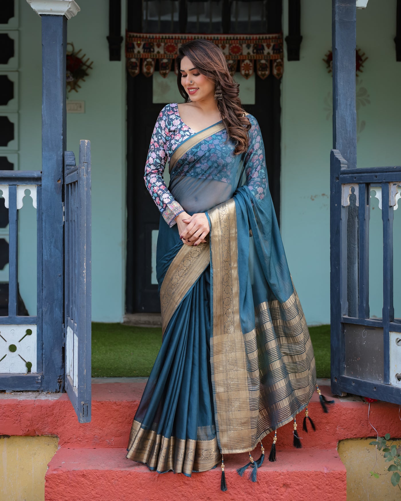 Teal Blue Plain Chiffon Saree with Gold Zari Border, Floral Printed Blouse & Tassel Detailing