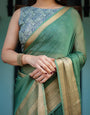 Mint Green Plain Chiffon Saree with Gold Zari Border, Geometric Printed Blouse & Tassel Detailing