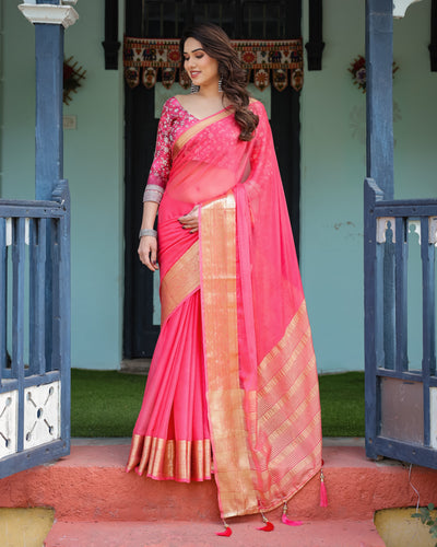 Ravishing Rani Pink Plain Chiffon Saree with Gold Zari Border, Floral Printed Blouse & Tassel Accents