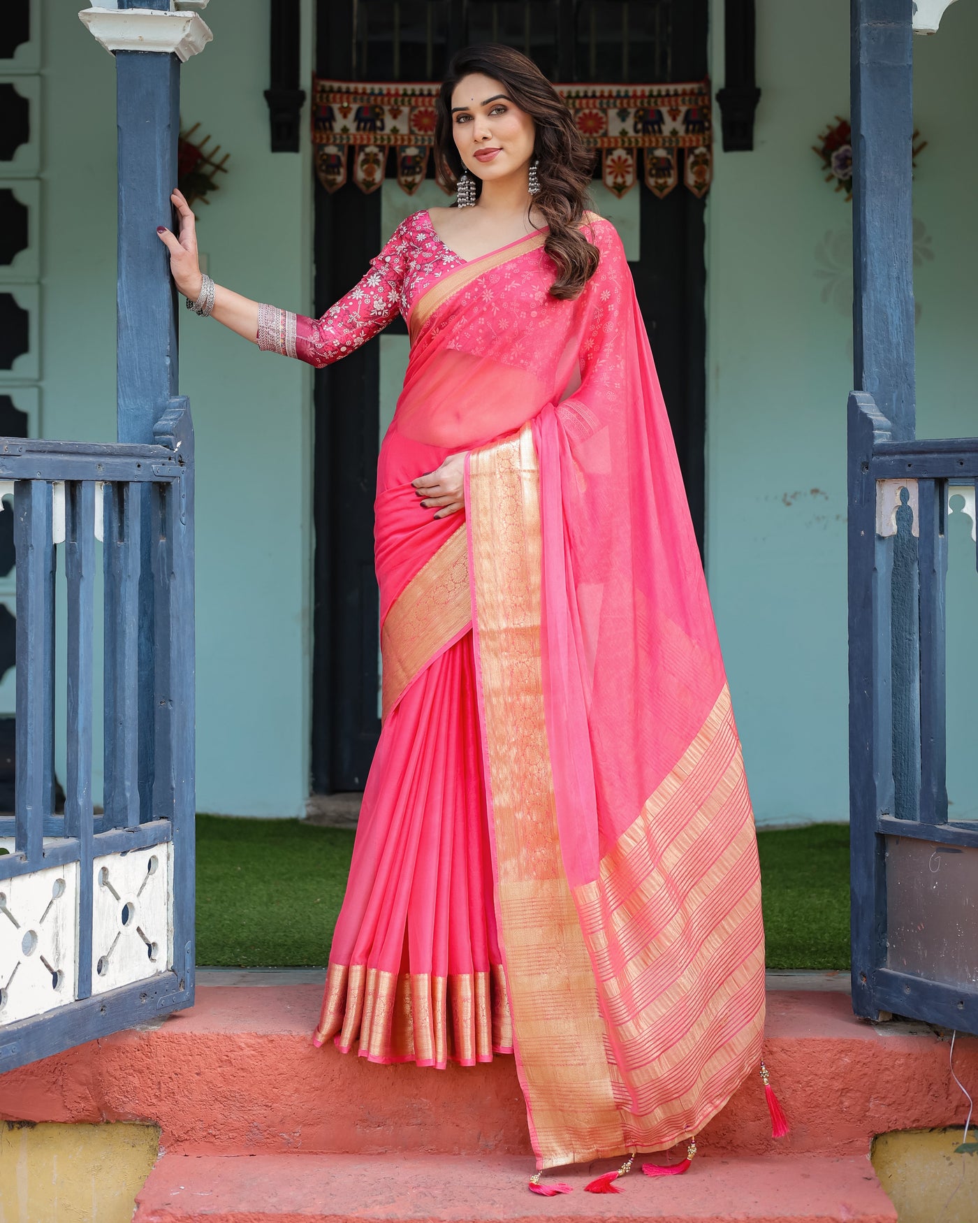 Ravishing Rani Pink Plain Chiffon Saree with Gold Zari Border, Floral Printed Blouse & Tassel Accents