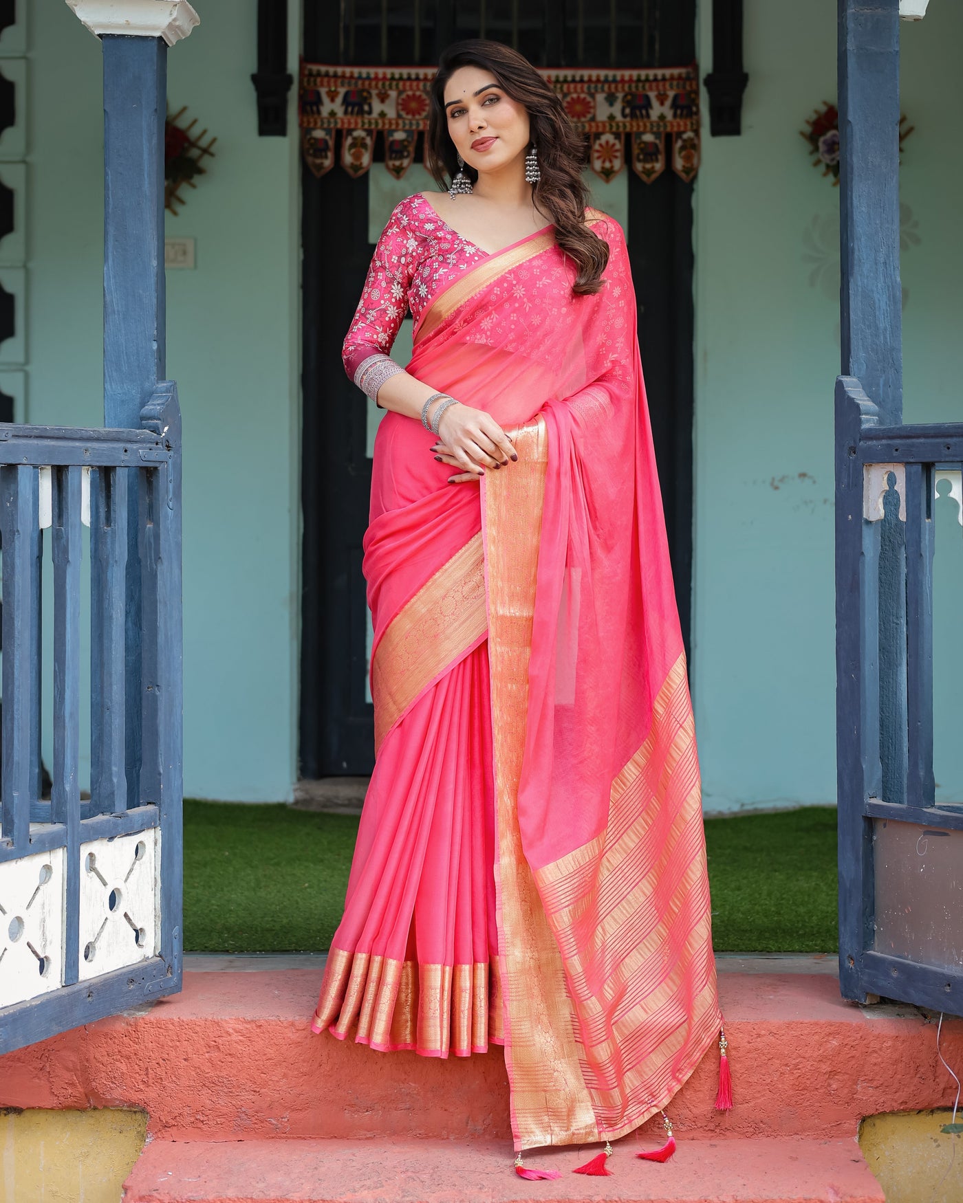 Ravishing Rani Pink Plain Chiffon Saree with Gold Zari Border, Floral Printed Blouse & Tassel Accents