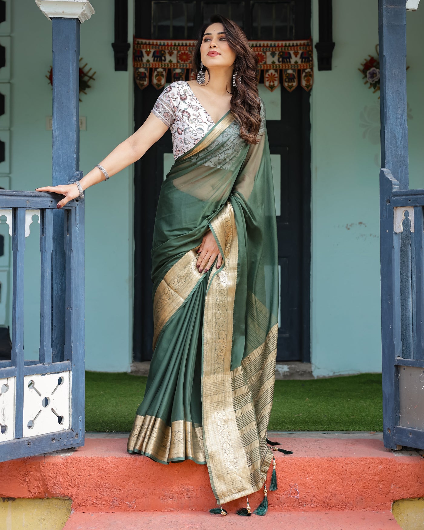 Elegant Bottle Green Plain Chiffon Saree with Gold Zari Border, Floral Printed Blouse & Tassel Finishing