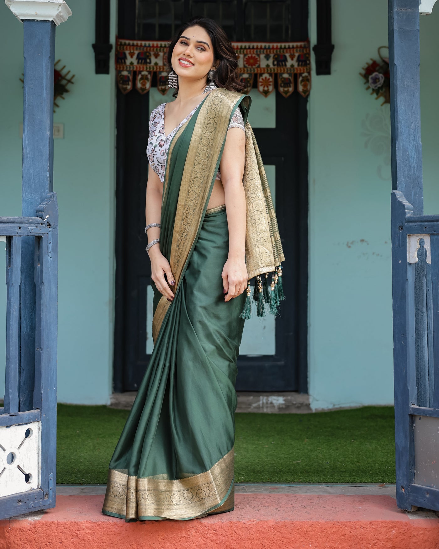 Elegant Bottle Green Plain Chiffon Saree with Gold Zari Border, Floral Printed Blouse & Tassel Finishing