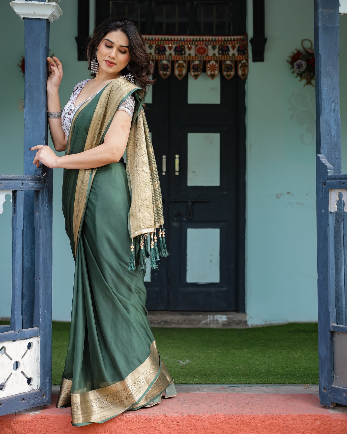 Elegant Bottle Green Plain Chiffon Saree with Gold Zari Border, Floral Printed Blouse & Tassel Finishing