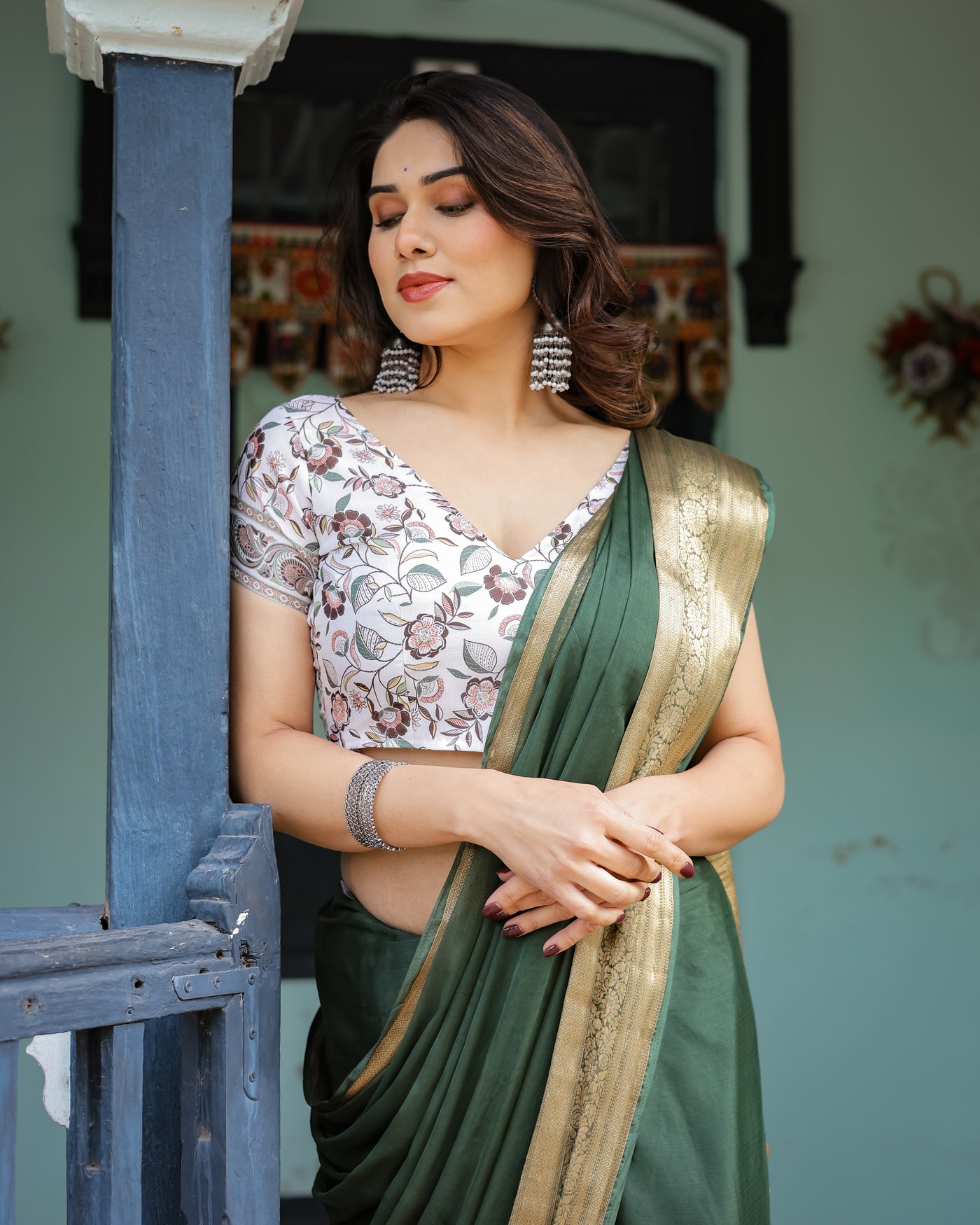 Elegant Bottle Green Plain Chiffon Saree with Gold Zari Border, Floral Printed Blouse & Tassel Finishing