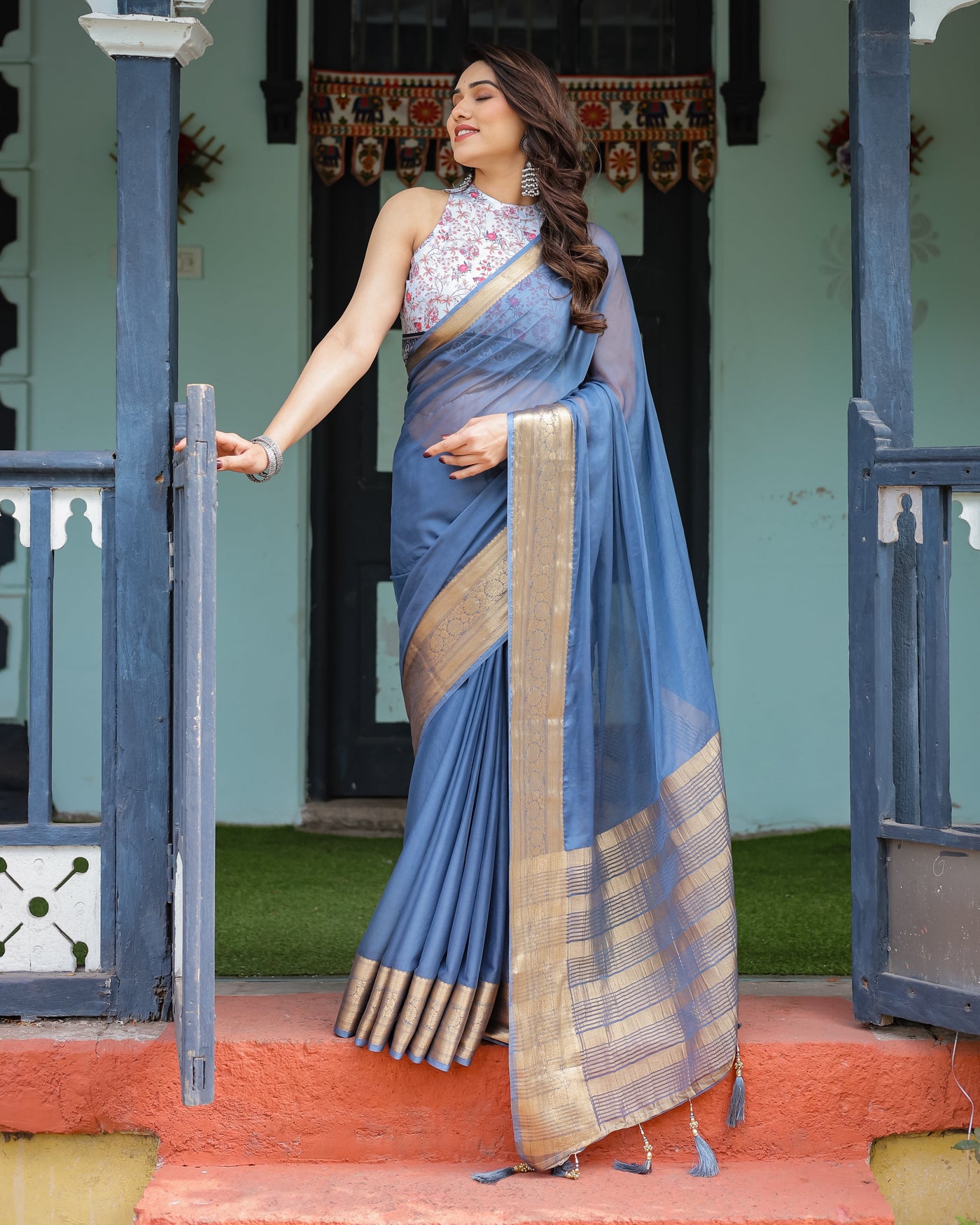 Serene Steel Blue Plain Chiffon Saree with Gold Zari Border, Floral Printed Blouse & Tassel Detailing