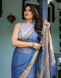 Serene Steel Blue Plain Chiffon Saree with Gold Zari Border, Floral Printed Blouse & Tassel Detailing