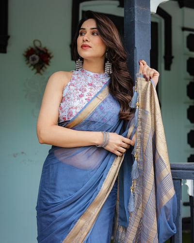 Serene Steel Blue Plain Chiffon Saree with Gold Zari Border, Floral Printed Blouse & Tassel Detailing