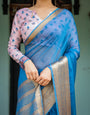 Vibrant Sky Blue Plain Chiffon Saree with Gold Zari Border, Floral Printed Blouse & Tassel Accents