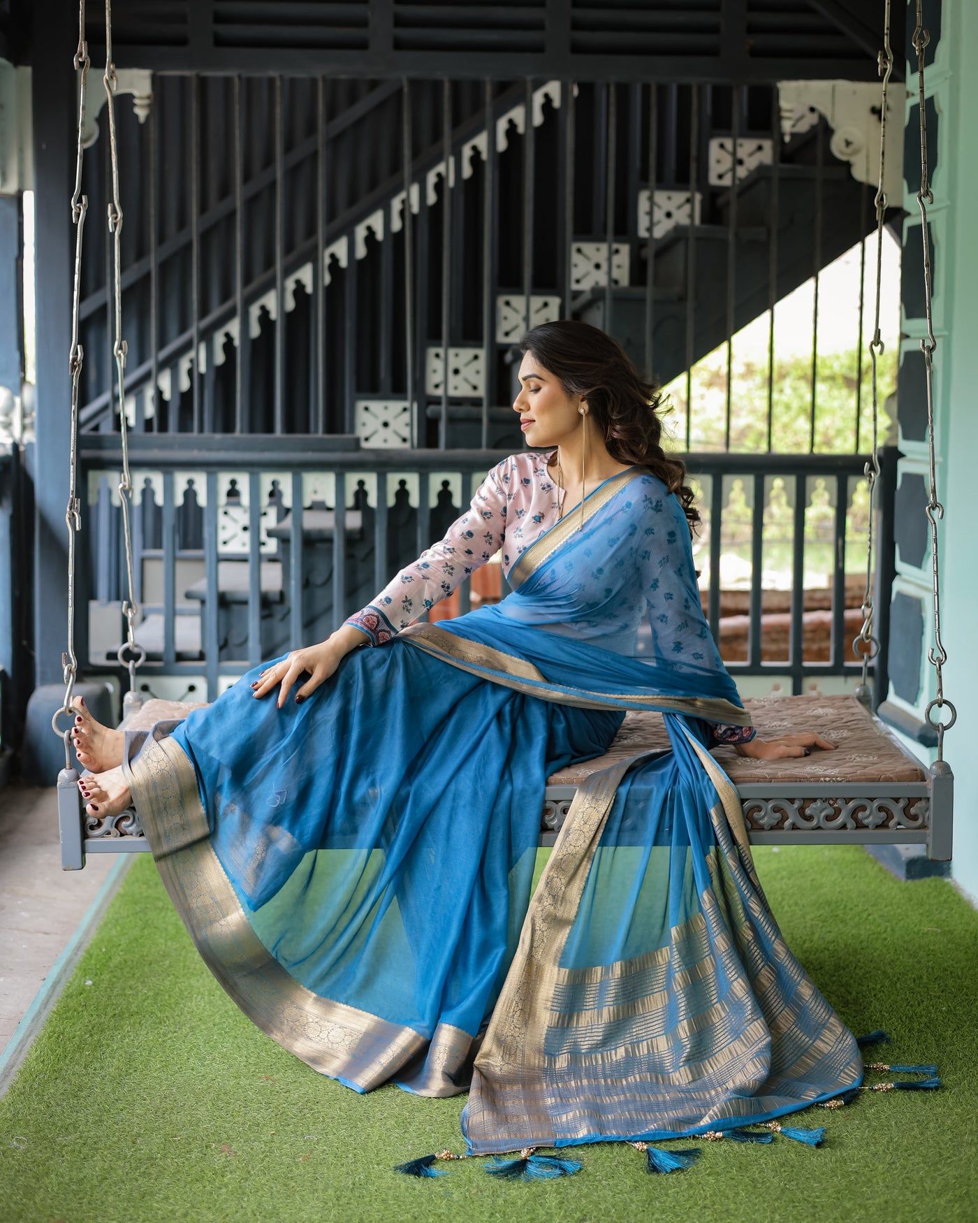 Vibrant Sky Blue Plain Chiffon Saree with Gold Zari Border, Floral Printed Blouse & Tassel Accents