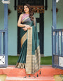 Enchanting Forest Green Plain Chiffon Saree with Gold Zari Border, Floral Printed Blouse & Tassel Details