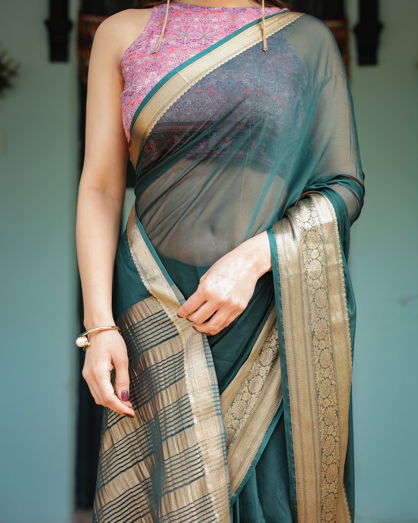 Enchanting Forest Green Plain Chiffon Saree with Gold Zari Border, Floral Printed Blouse & Tassel Details