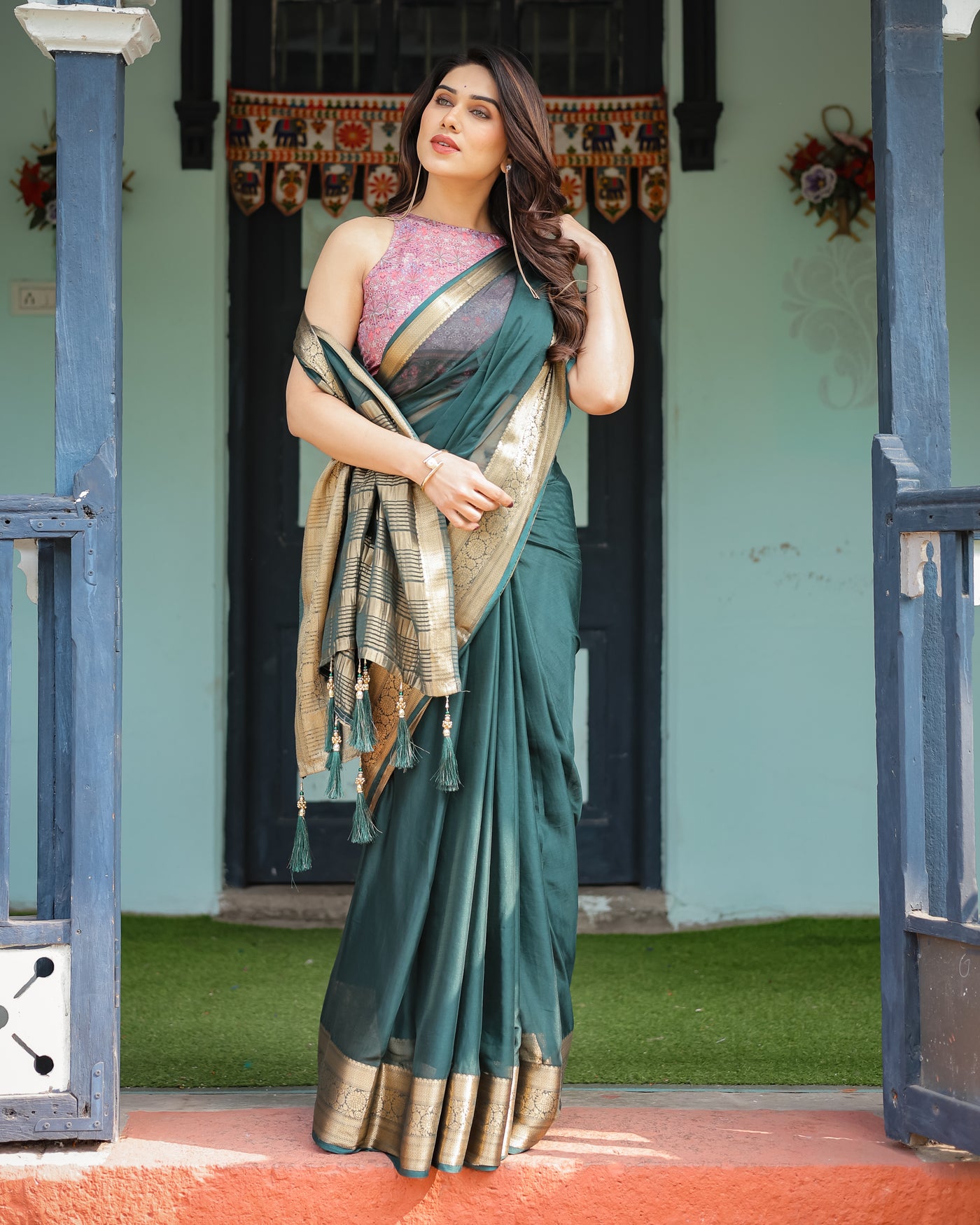 Enchanting Forest Green Plain Chiffon Saree with Gold Zari Border, Floral Printed Blouse & Tassel Details