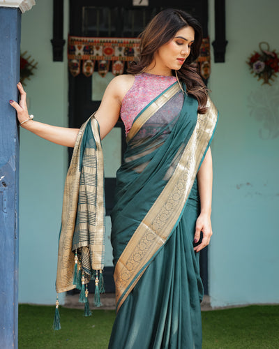 Enchanting Forest Green Plain Chiffon Saree with Gold Zari Border, Floral Printed Blouse & Tassel Details