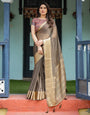 Elegant Olive Brown Plain Chiffon Saree with Gold Zari Border, Paisley Printed Blouse & Tassel Detailing