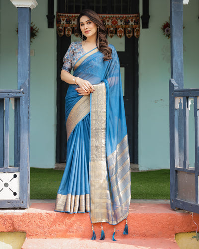 Vibrant Peacock Blue Plain Chiffon Saree with Gold Zari Border, Floral Printed Blouse & Tassel Accents